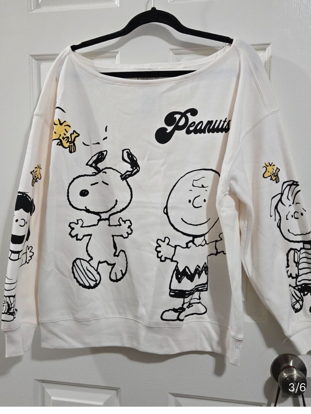 Peanuts Cream Off-Shoulder Snoopy & Friends Graphic Sweater - Picture 2 of 5